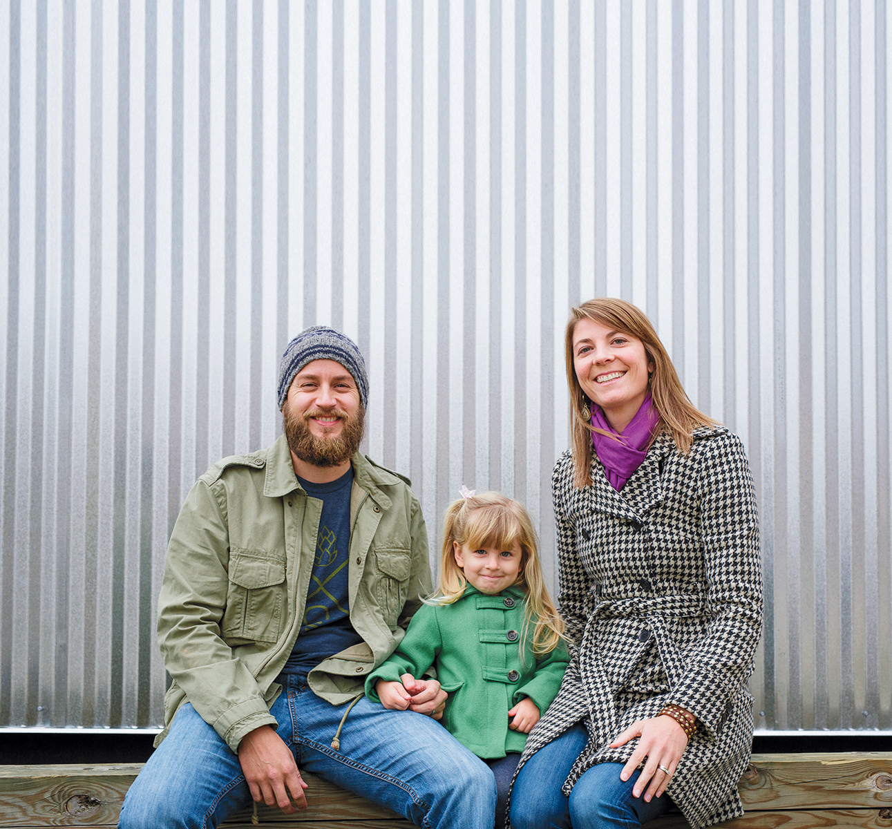 Jesse and Amanda Sensenig, shown with their daughter, Carly, age 3, will open Goshen Brewing Company in 2015
