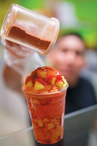 A Mango Shaved Ice topped off with spicy syrup and chile powder