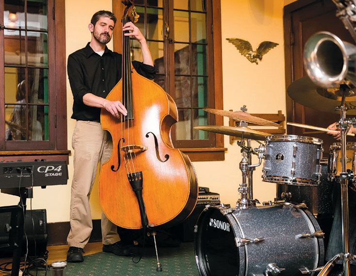 A musician plays the upright bass at the iRock festival.