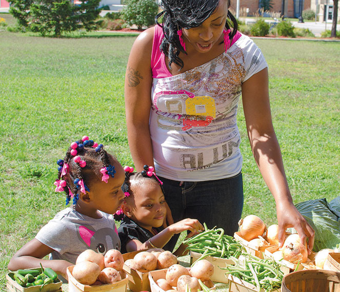 Children picking out vegetables