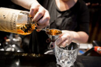 Common-Spirits-cocktails-pour.jpg